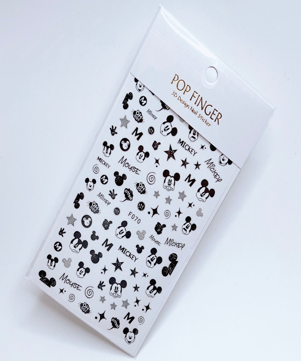 Classic Black and White Mickey Mouse Decal" "Monochrome Mickey Mouse Cartoon Sticker" "Charming Mickey Mouse Design Sticker Set" "Vintage Style Mickey Mouse Stickers" "Black and White Cartoon Mickey Mouse Decals" "Monotone Mickey Mouse Emblem Stickers" "Timeless Mickey Mouse Character Labels" "Black & White Mickey Mouse Graphics" "Iconic Mickey Mouse Print Stickers" "Sleek Mickey Mouse Black & White Prints