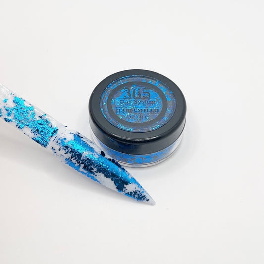 Brilliant Blue Platinum Flakes" "Vivid Metallic Blue Flake Finish" "Shimmering Blue with Platinum Hue" "Glistening Metallic Blue Particles" "Lustrous Blue Platinum Flakes" "Reflective Metallic Blue Shards" "Vibrant Blue with Platinum Shine" "Iridescent Blue Metallic Elements" "Dazzling Blue Platinum Accents" "Sparkling Metallic Blue Specks"